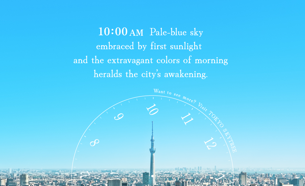 10:00 AM  Pale-blue sky embraced by first sunlight and the extravagant colors of morning heralds the city's awakening.
