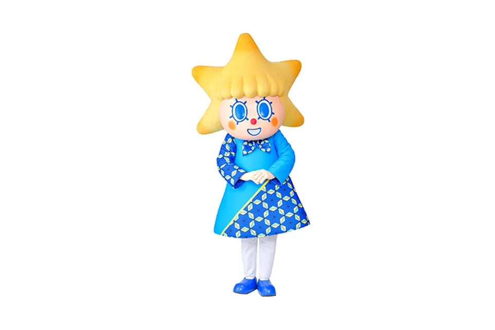 This is a limited-edition costume for Sorakara-chan , the Official characters of TOKYO SKYTREE . The dress is primarily light blue, and features a dark blue hemp leaf pattern with yellow accents on the ribbon around the neck, sleeves, and the right side of the skirt. The star-shaped headpiece and the vibrant Japanese-modern patterned dress create a bright and friendly design.