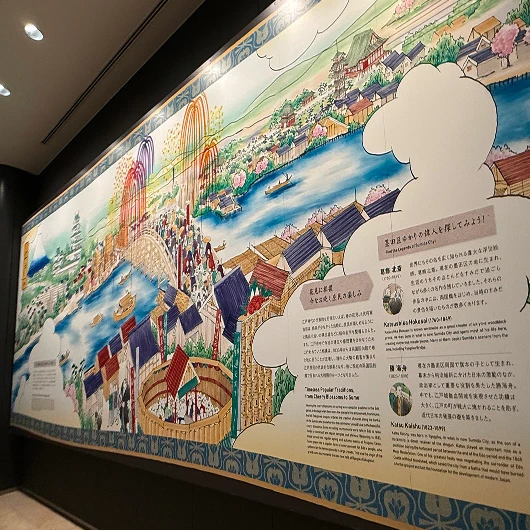 隅田川の賑わいと両国橋を描いた伝統的な浮世絵